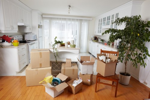 Moving a piano through a Kingston property with stairs