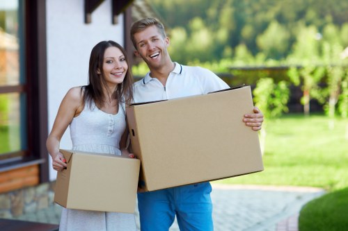 Professional moving crew managing access and parking during a Kingston removal