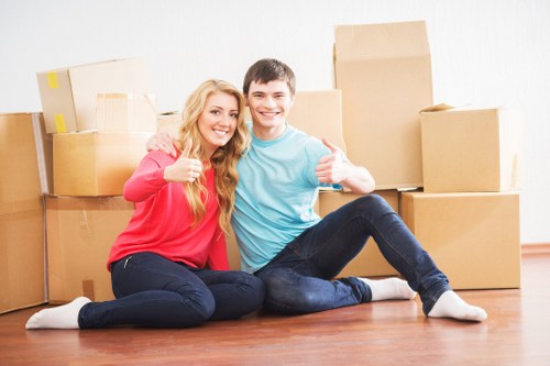 Local movers handling furniture and boxes for an urgent Kingston relocation