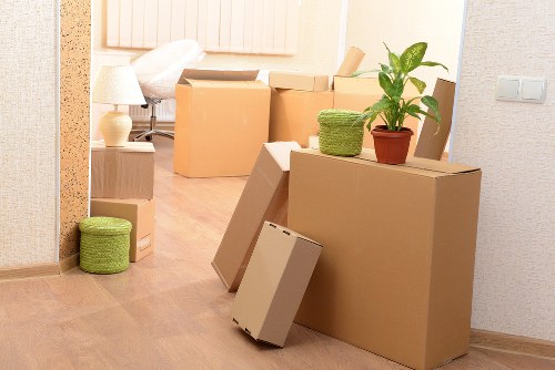 Carefully labelled moving boxes and wrapped household items